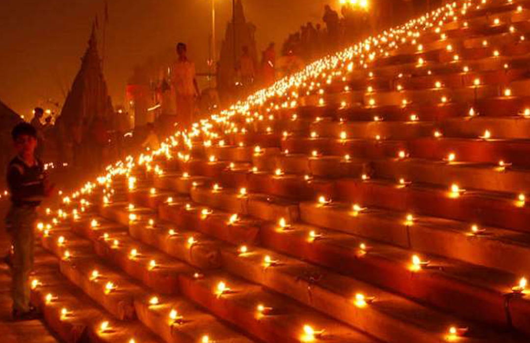 Earthen diya oil lamp lit during Dev Deepawali in Varanasi