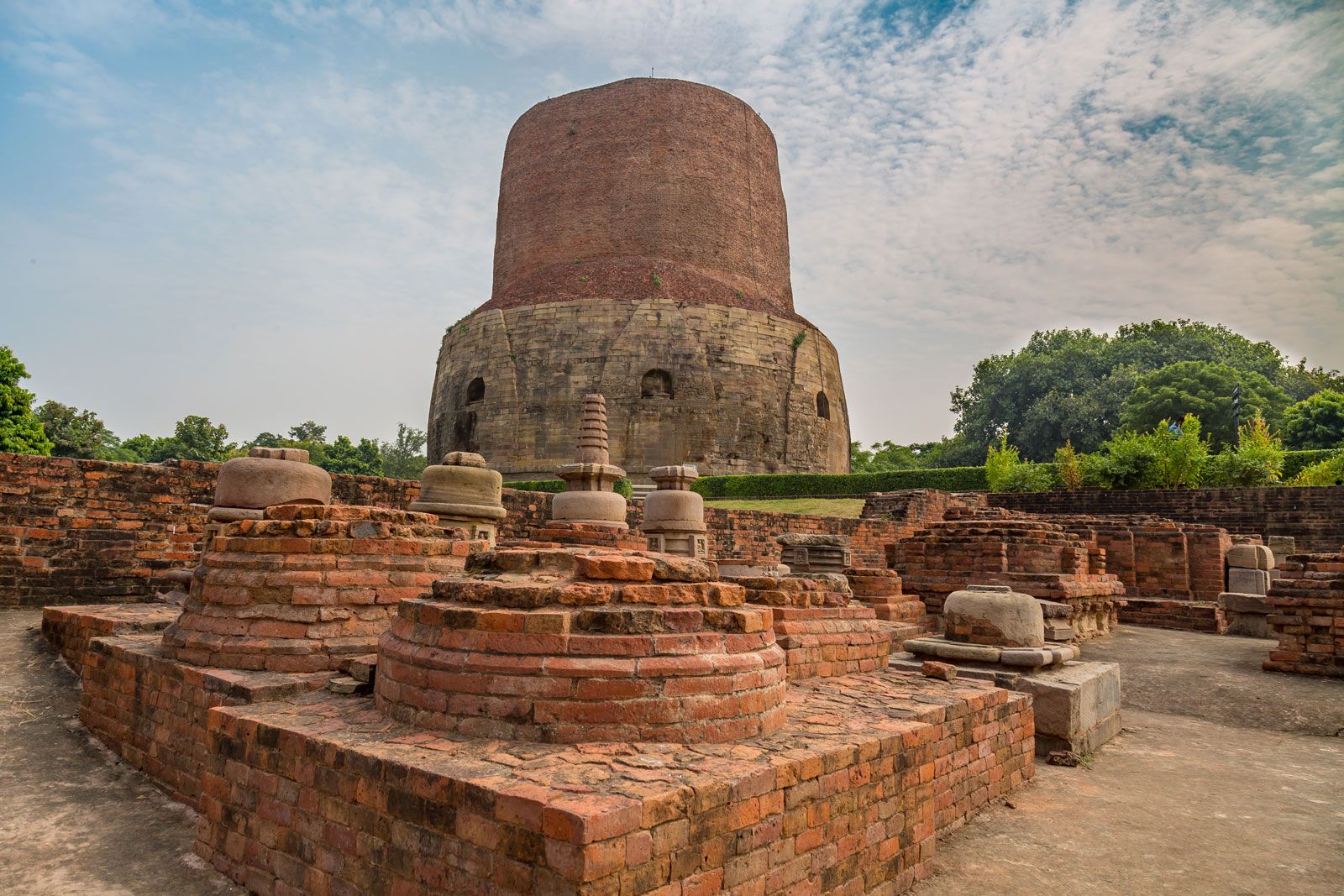 Dhamek Stupa at Sarnath, a massive cylindrical stone structure dating to the 5th century